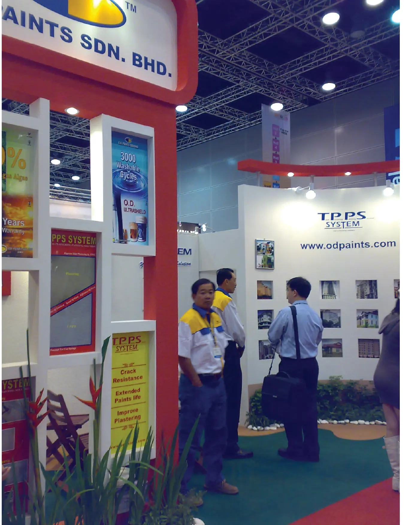 O.D. Paints exhibition booth with product displays and visitors at ARCHIDEX Malaysia